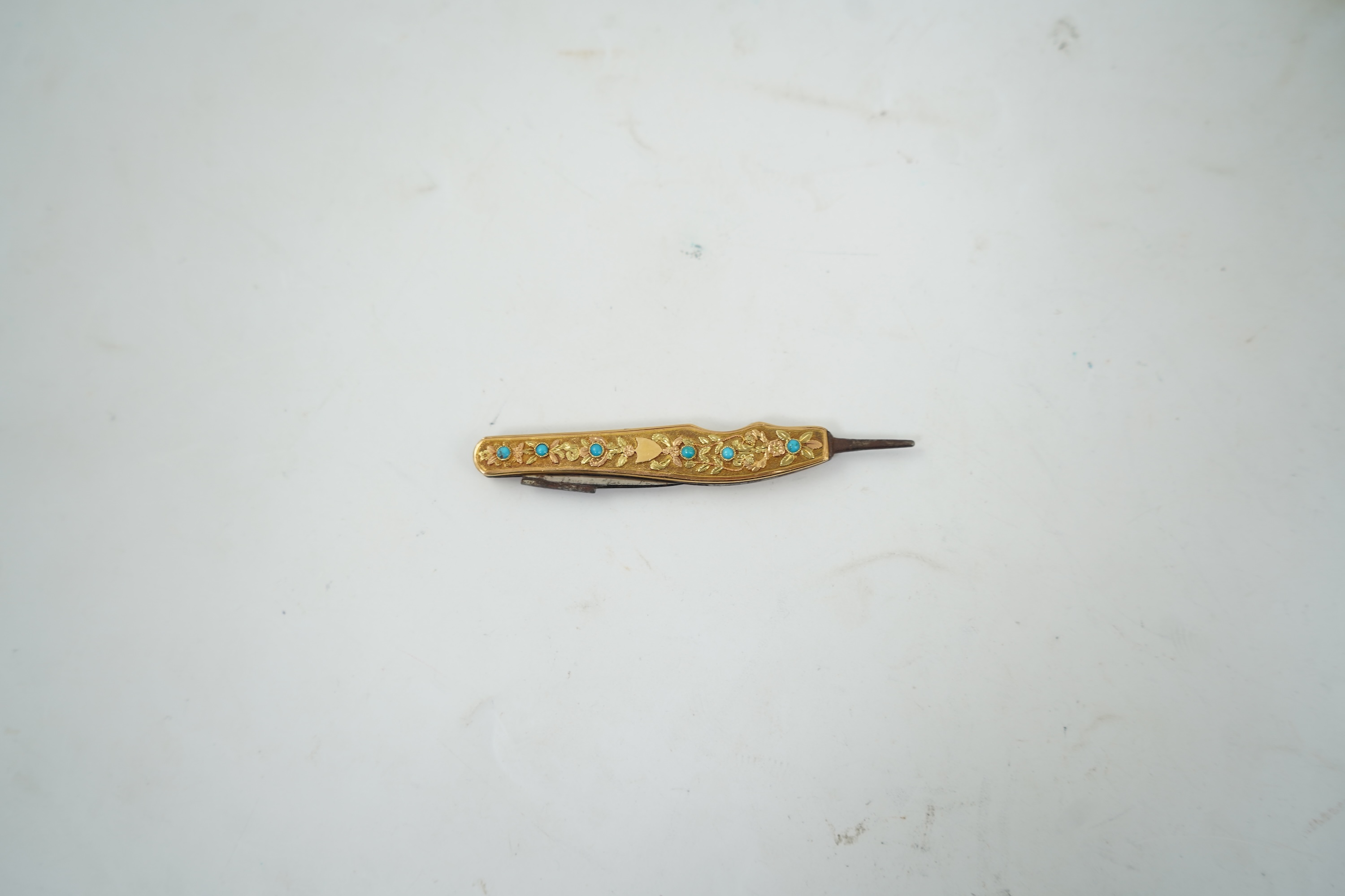 A mid 19th century French opaline glass necessaire box with turquoise and gold mounted accessories